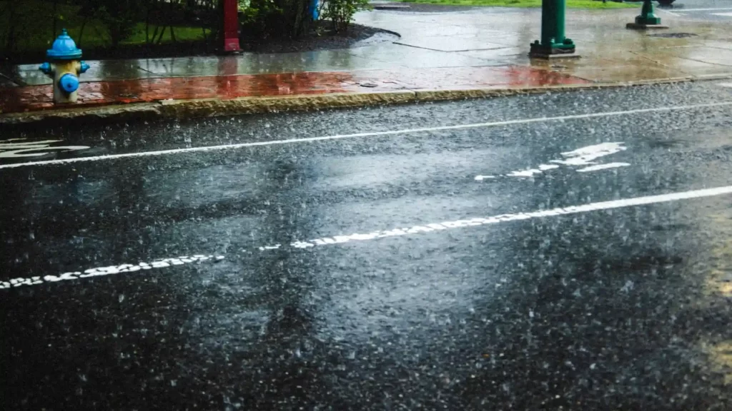 A street is being flooded by rain