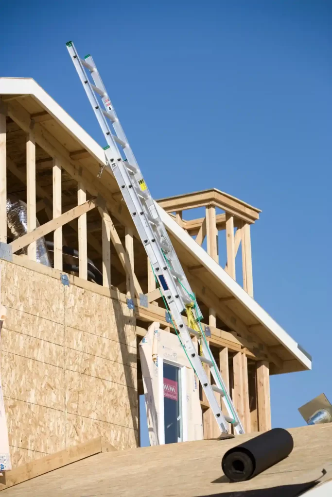 Ladder on wooden house construction