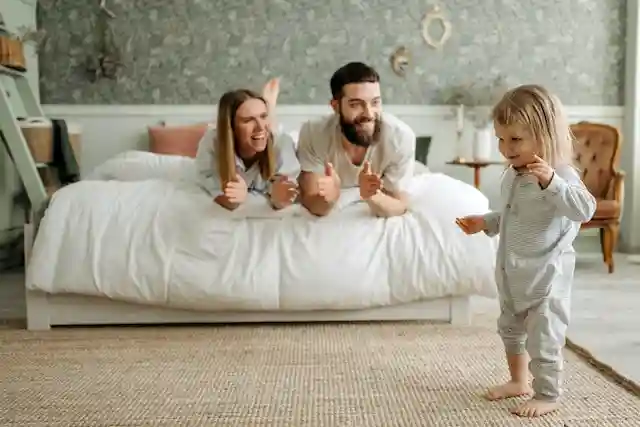 Parents clapping for their child